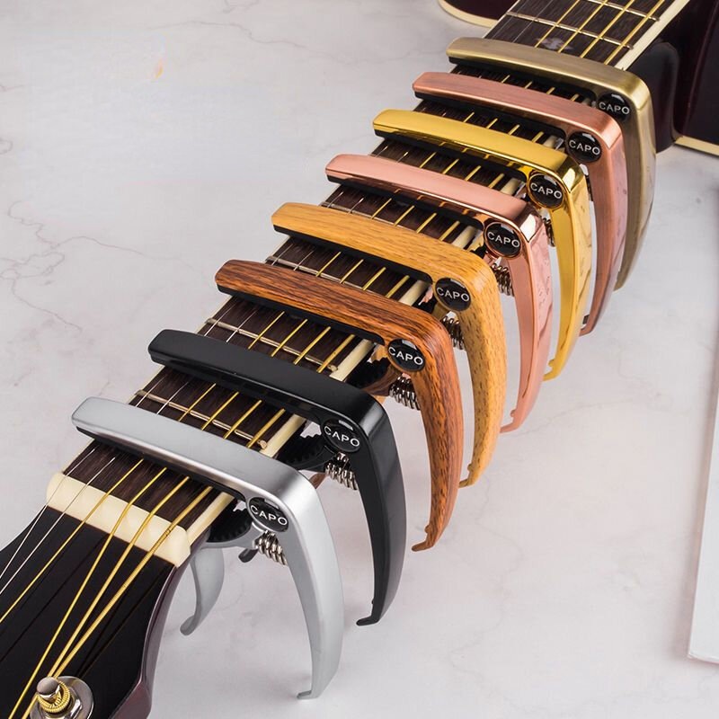 يمكن لمقطع ضبط الغيتار الشعبي من سبيكة الزنك المحسن بدء تشغيل سلسلة المسامير الباكليت الكلاسيكي القيثارة باس ضبط الغيتار كليب