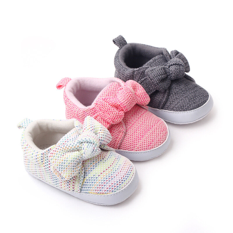 أحذية للأطفال الرضع والأولاد والبنات أحذية لينة وحيد بلون واحد للأطفال حديثي الولادة سرير أطفال Bowknot المضادة للانزلاق الأولى مشوا