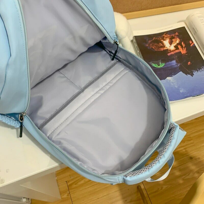 EST بلون حقيبة Girlsa مدرسة الطالب حقيبة ظهر عادية متعددة الوظائف حقيبة الظهر النايلون الإناث Kawaii قلادة أكياس Mochila