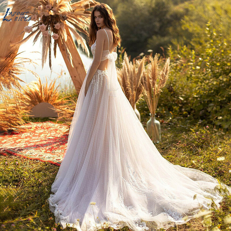 فستان زفاف بفيونكة للشاطئ بتصميم a-line Boho 2022 من الدانتيل مفتوح من الخلف بدون أكمام فستان العروس الأميرة فيستدو دي نويفا