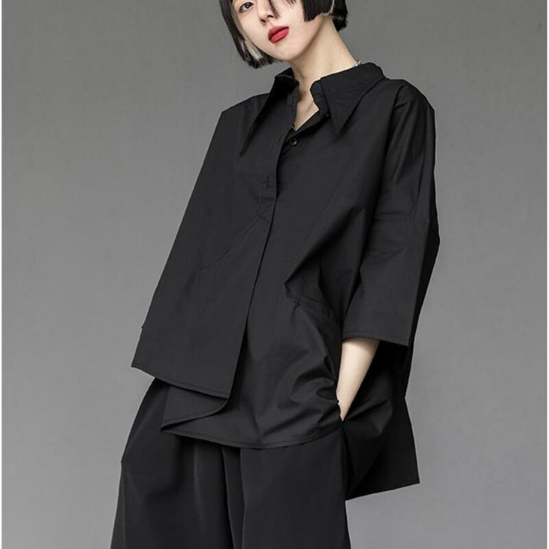 الصيف فضفاضة المرأة قصيرة الأكمام قميص أسود مصمم غير النظامية ثلاثة أرباع الأكمام قميص علوي الكورية أزياء الشارع الشهير الرجعية