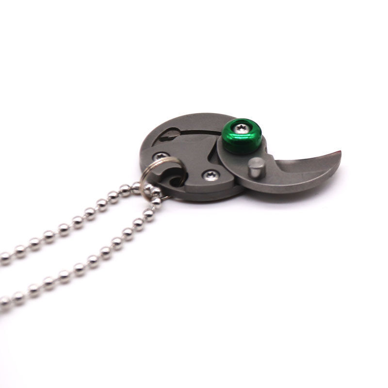 متعددة الوظائف الإبداعية مصغرة التيتانيوم عملة سكين في الهواء الطلق TC4 جيب المفاتيح تفريغ أداة الفولاذ المقاوم للصدأ سكين حمل