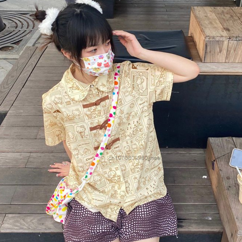 Sanrio مرحبا كيتي فضفاضة بلوزة غير رسمية Y2k فتاة جديدة الصيف موضة مطبوعة تي شيرت Y2k الكرتون الملابس بلوزة تي شيرت Harajuku
