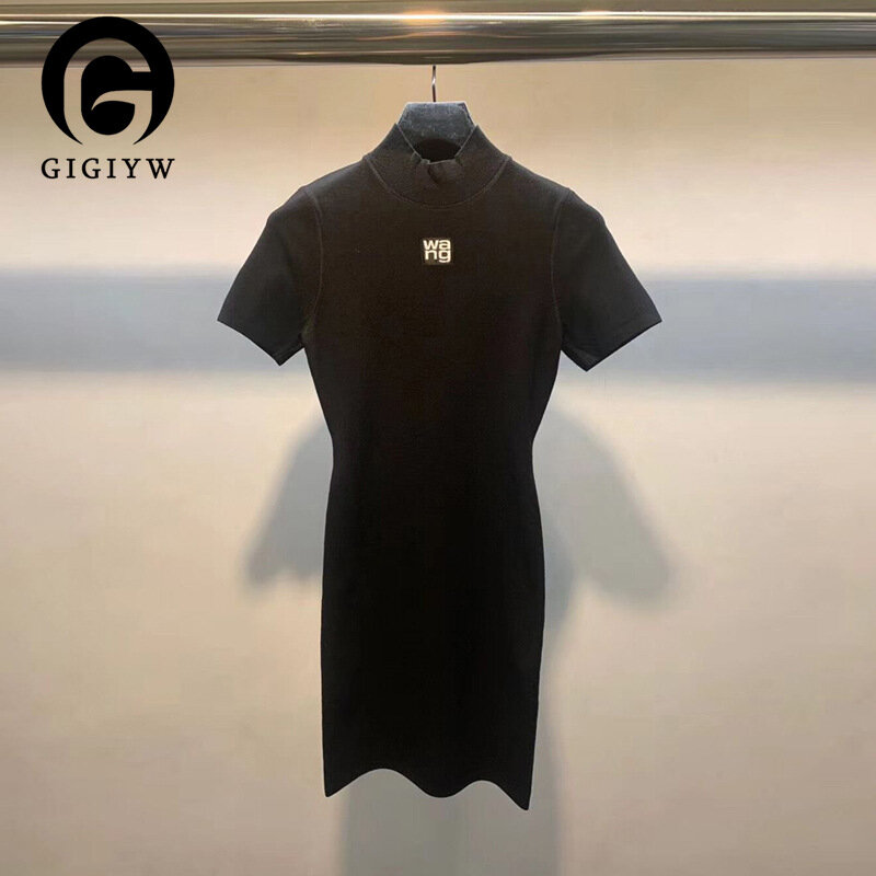 GIGIYW ربيع وصيف Aw Wang Hip تنّورة ملفوفة متعددة الاستخدامات ، نحيفة وإغلاق الخصر أسود محبوك فستان قصير الأكمام أنثى
