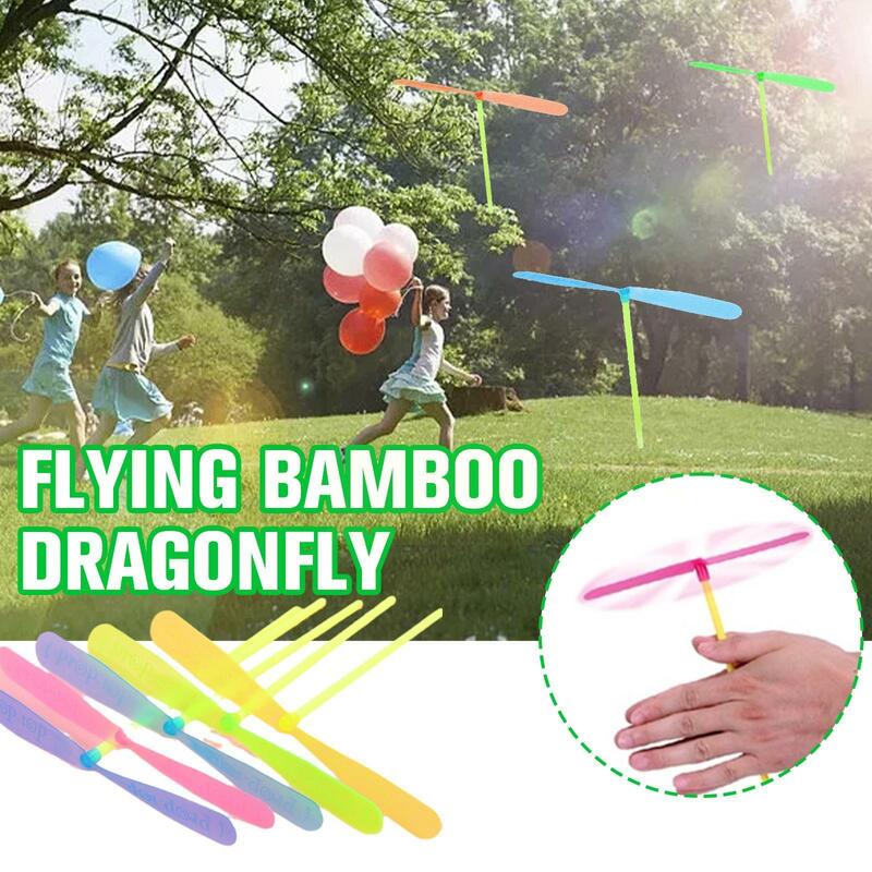 100pcs Bamboo Dragonfly Hand Rub Flash Flying Fairy Gadgets Small Gifts Toys X4j9
