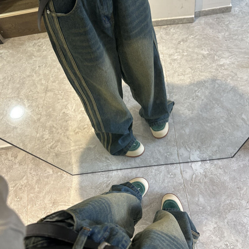جينز ضيق واسع الساق بتصميم جانبي أنيق واسع جينز نسائي للخريف والشتاء بخصر مرتفع فضفاض